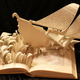 Illustration for article titled Storybook characters burst from their pages in these incredible paper sculptures